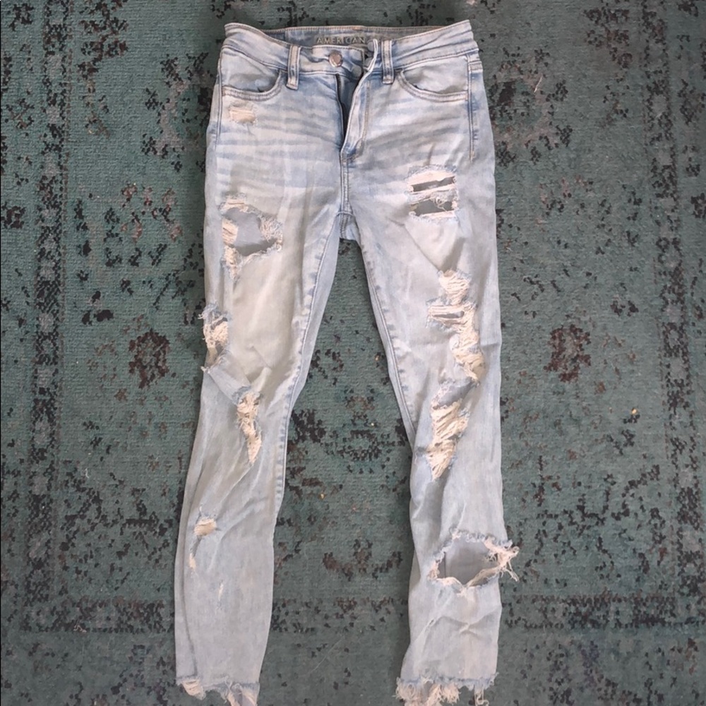 very ripped jeans